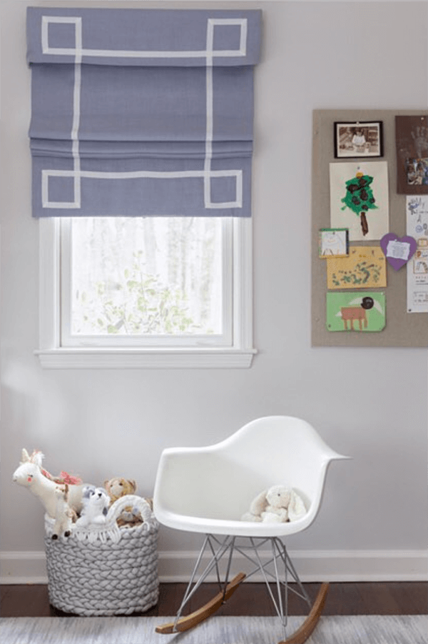 Interior designer Kristin Casey adds a fretwork detail to nursery windows using Samuel & Sons' French Grosgrain Ribbon.