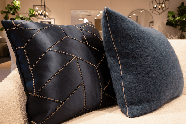 Custom pillow trimmed with Cambridge cord from Samuel & Sons, designed by Kneedler Fauchere. 