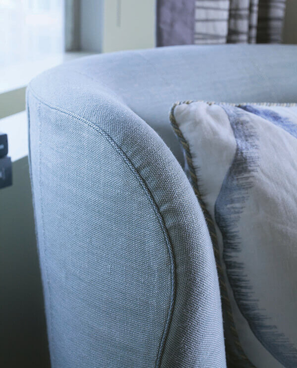Custom upholstery featuring the Cambridge Cord with Tape from Samuel & Sons.