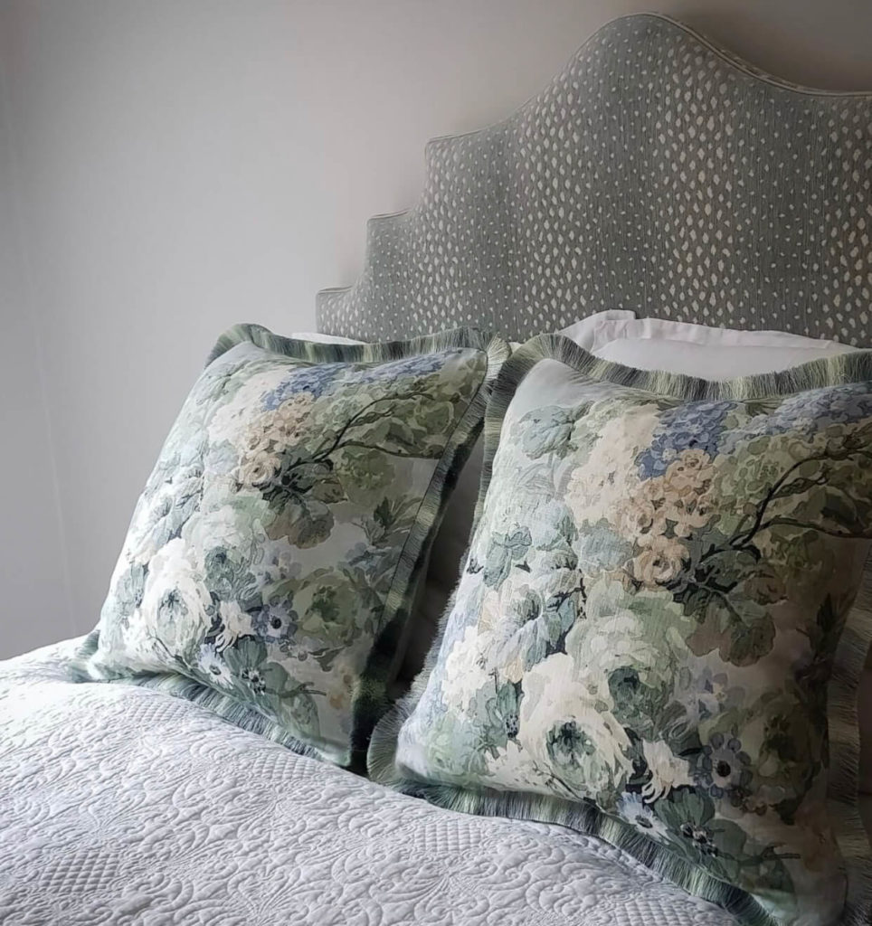 Custom pillows by Stella Mannering & Co featuring brush fringe by Samuel & Sons.