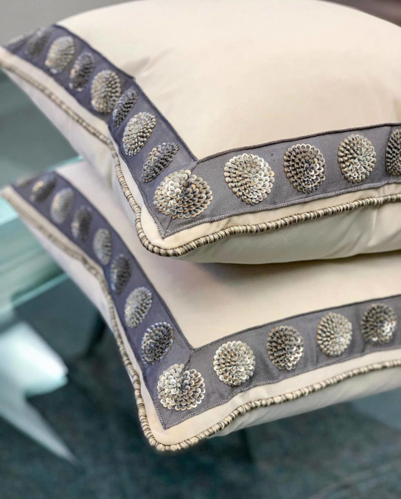 Custom pillow by Lina Fritschy Interior Design featuring a sequin border by Samuel & Sons