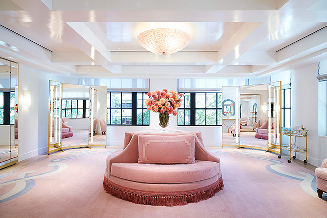 The Carolina Herrera boutique features a round pink settee 