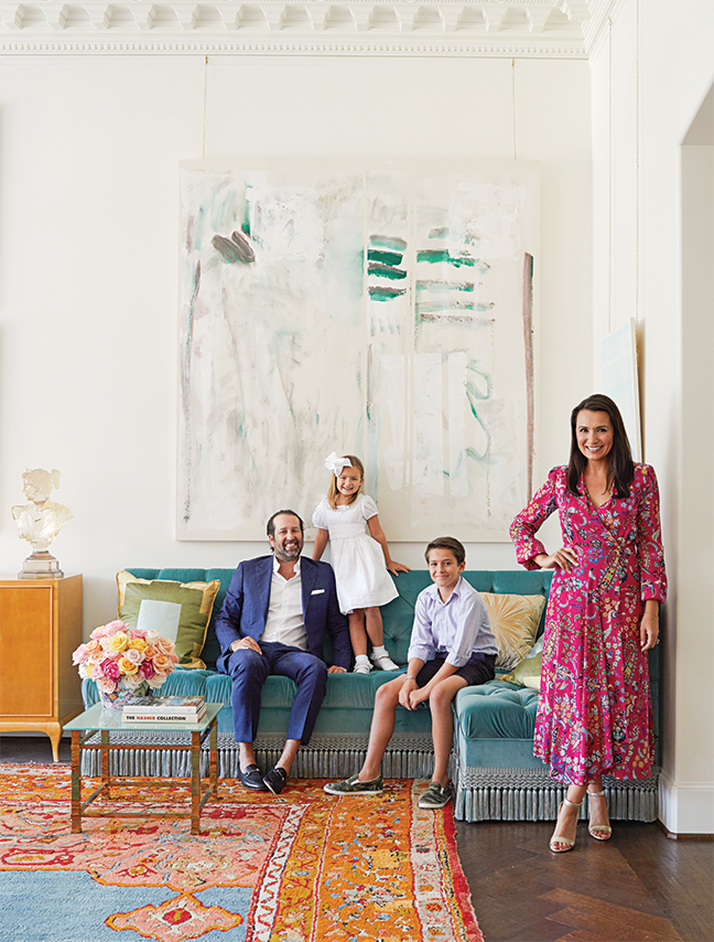Kimberly Schlegel Whitman's family in her living room